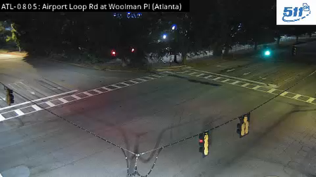 Airport Loop Rd at Woolman Pl